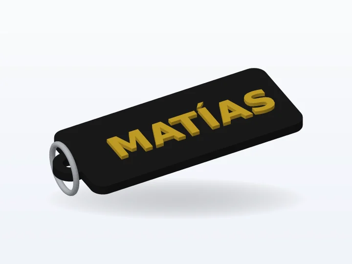 Llavero negro con el nombre MATÍAS en relieve dorado