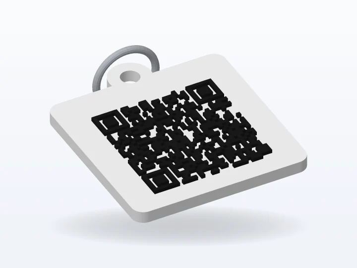 Llavero blanco con un código QR negro en relieve